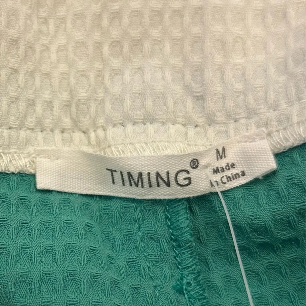 Timing bold teal